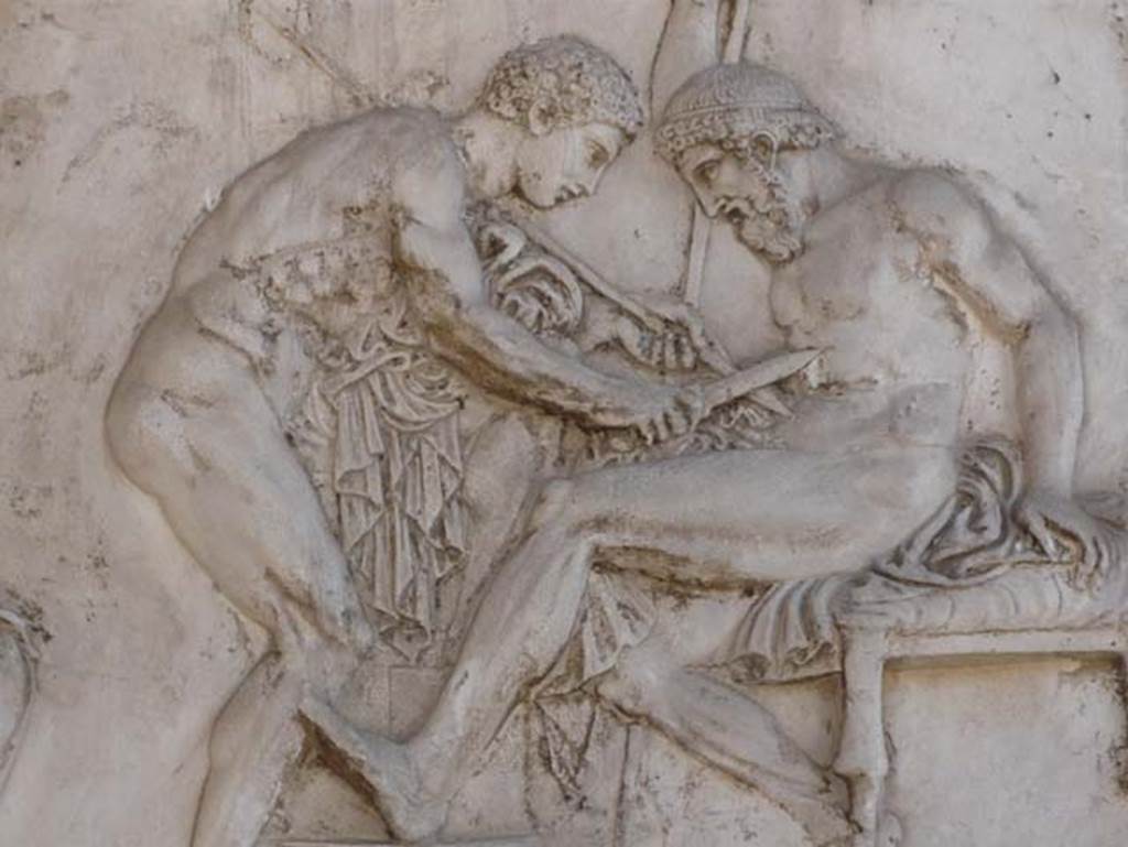 Ins. Or.I.2, Herculaneum. August 2013. Detail from plaster cast showing Achilles healing Telephus. The myth was that Telephus could only be healed by the rust of Achilles’ spear, the spear which had wounded him. Photo courtesy of Buzz Ferebee.